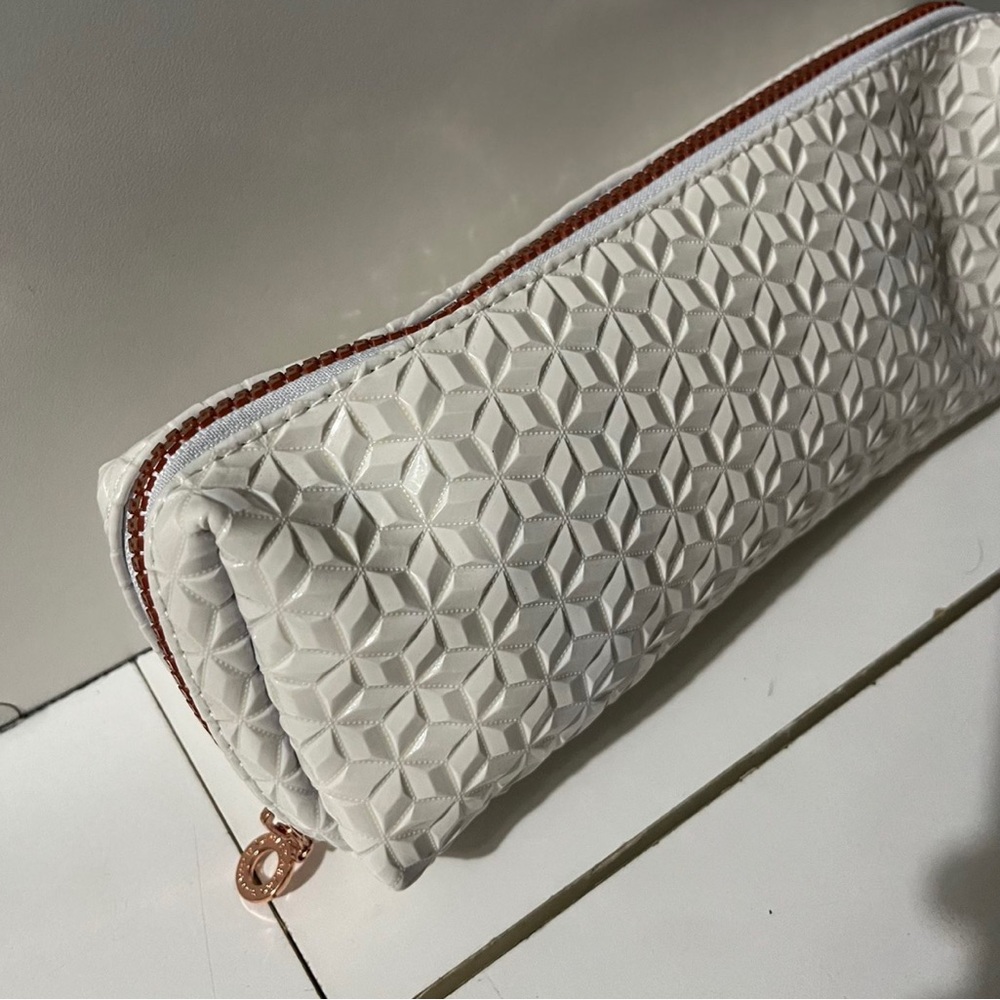 Bag good for make up brushes or can be a pencil bag anything